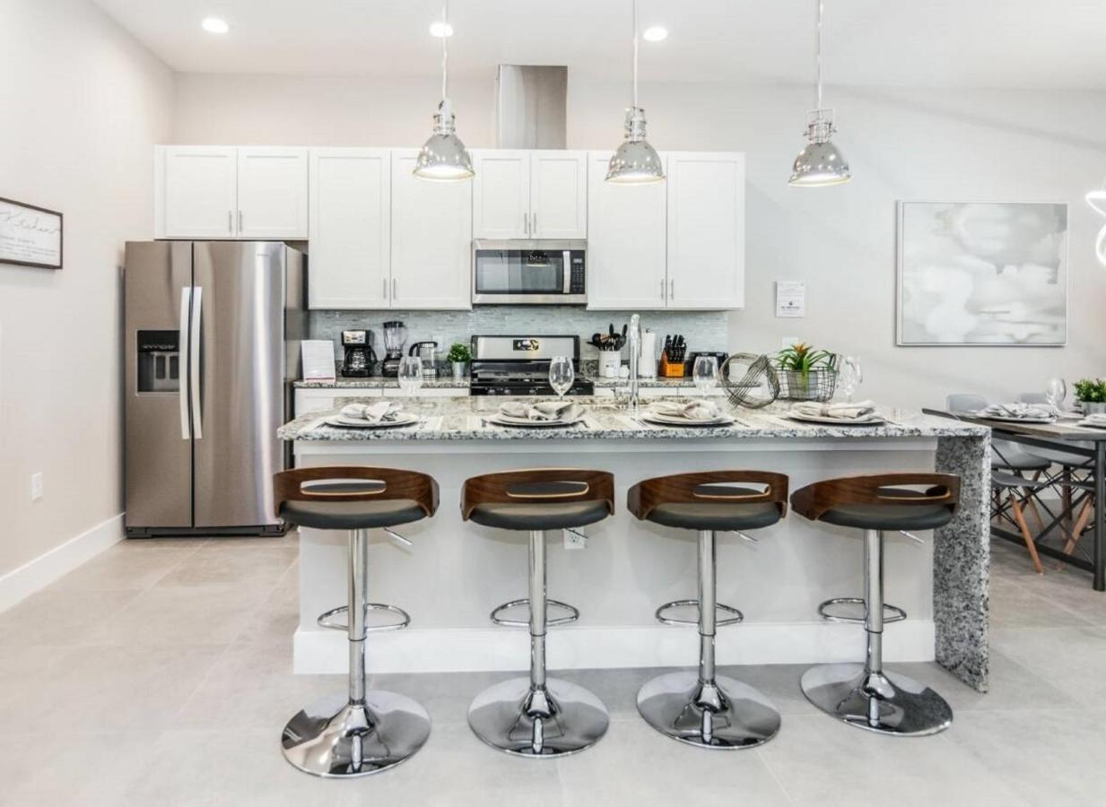 Holiday home Stunning Five Suites Townhouse With Summer Kitchen At Summerville 2668