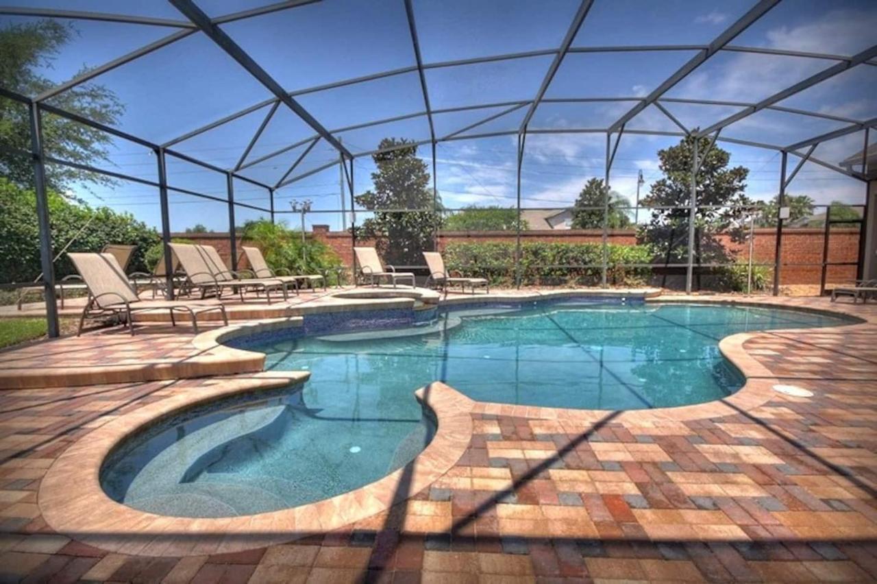 Mickey's Getaway: Luxe 7br Retreat With Pool & Theater Near Holiday home Orlando