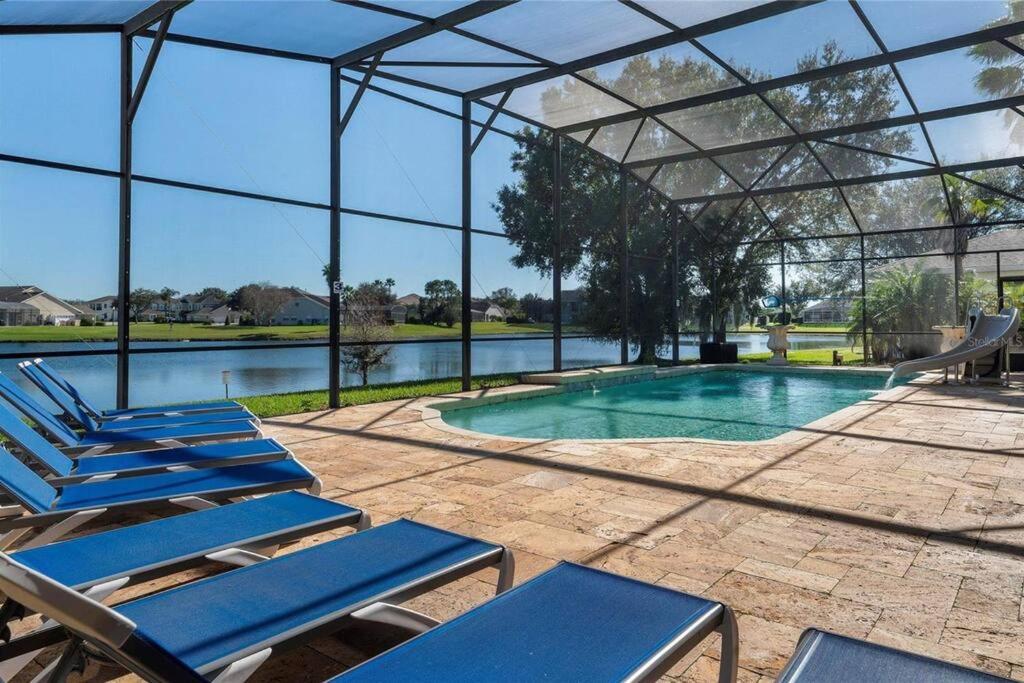 Mickeys Waterside - Gorgeous Waterside Southeast Facing 9br Pool & Hot Tub Bbq Cinema Rm 2 Miles To Orlando